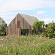 Cowshed in the Netherlands rebuilt as a timber-clad family home